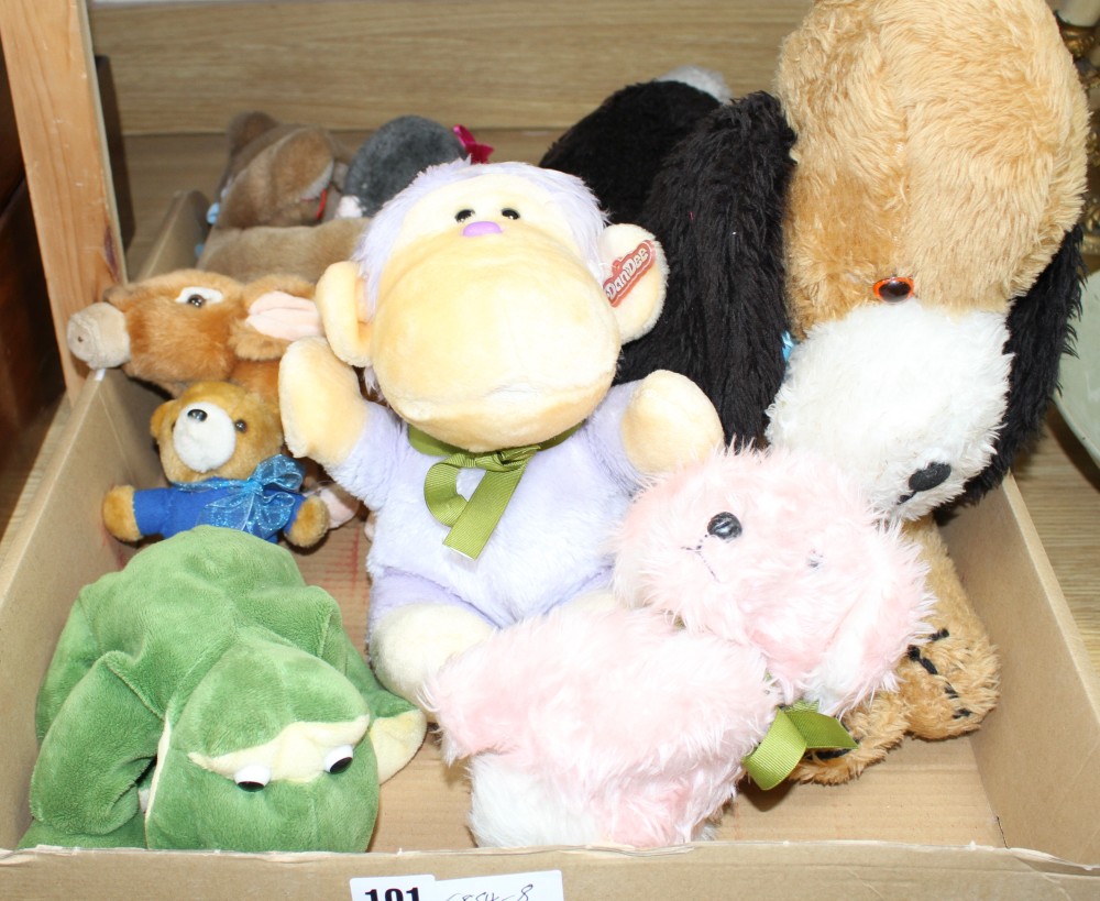 A group of assorted soft toys
